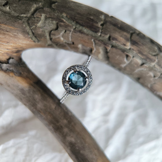 Silver ring with London Blue topaz and cubic zirconia