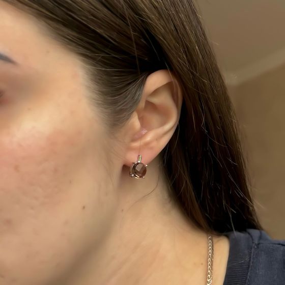 Silver earrings with 5.575 ct sultanaite