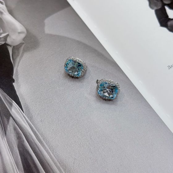 Срібні сережки з топазом 12,432 карата та фіанітами