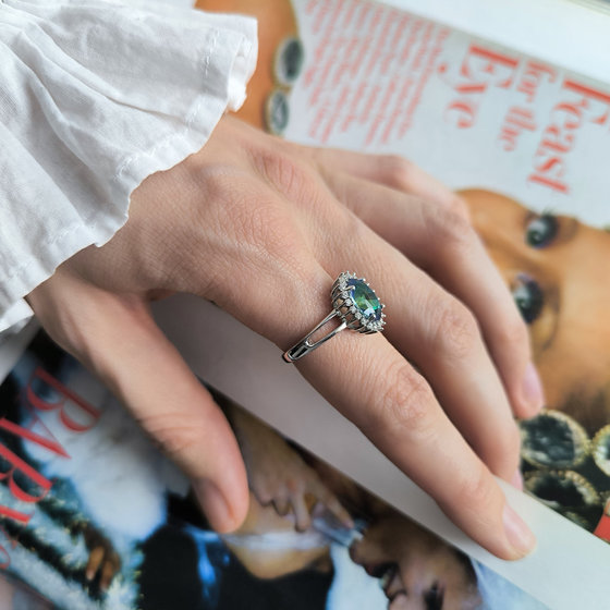 Silver ring with mystic topaz