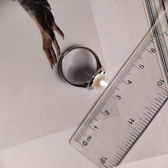 Silver ring with pearls