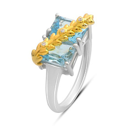 Silver ring with topaz, fianites