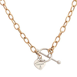 A gold necklace without stones