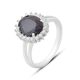 Silver ring with a sapphire and cubic zirconia