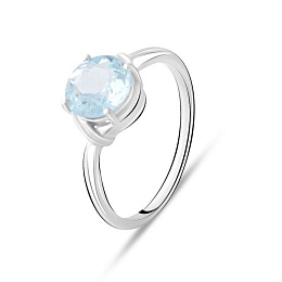 Silver ring with a topaz