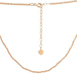 A gold necklace without stones
