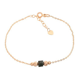 Gold bracelet with onyx